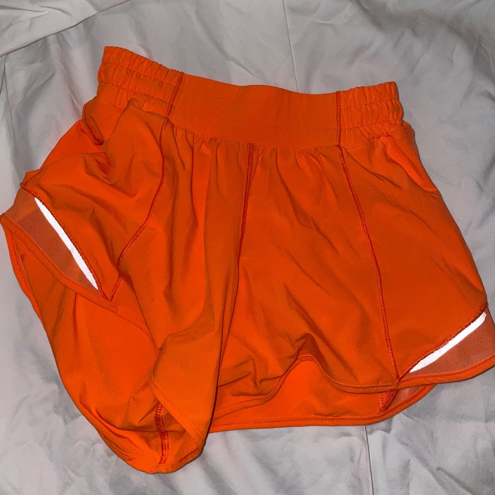 highlight orange lululemon shorts 4, 4”